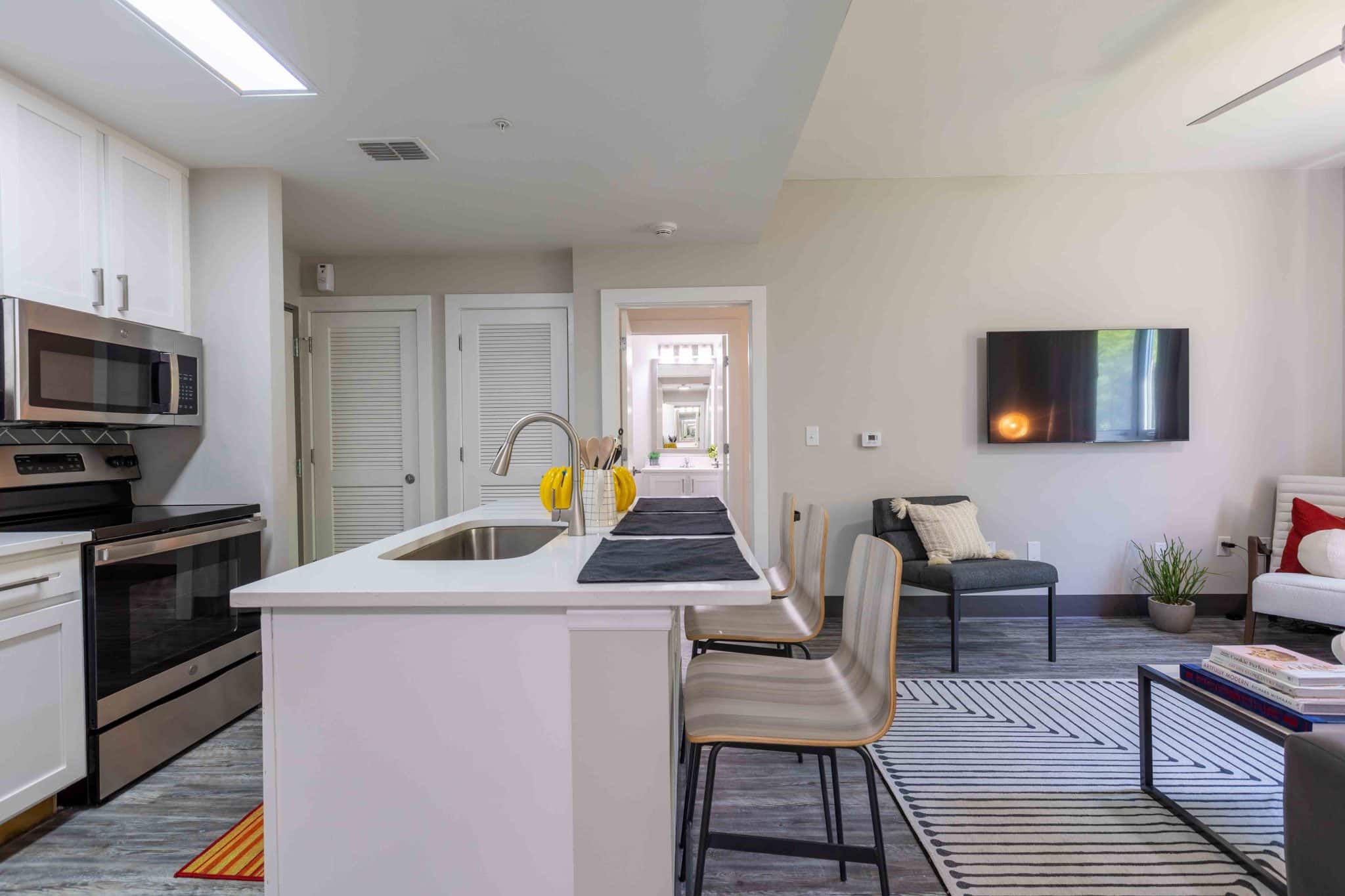 valentine commons off campus apartments just steps from nc state university platinum floor plans kitchen island seating plank flooring washer and dryer included