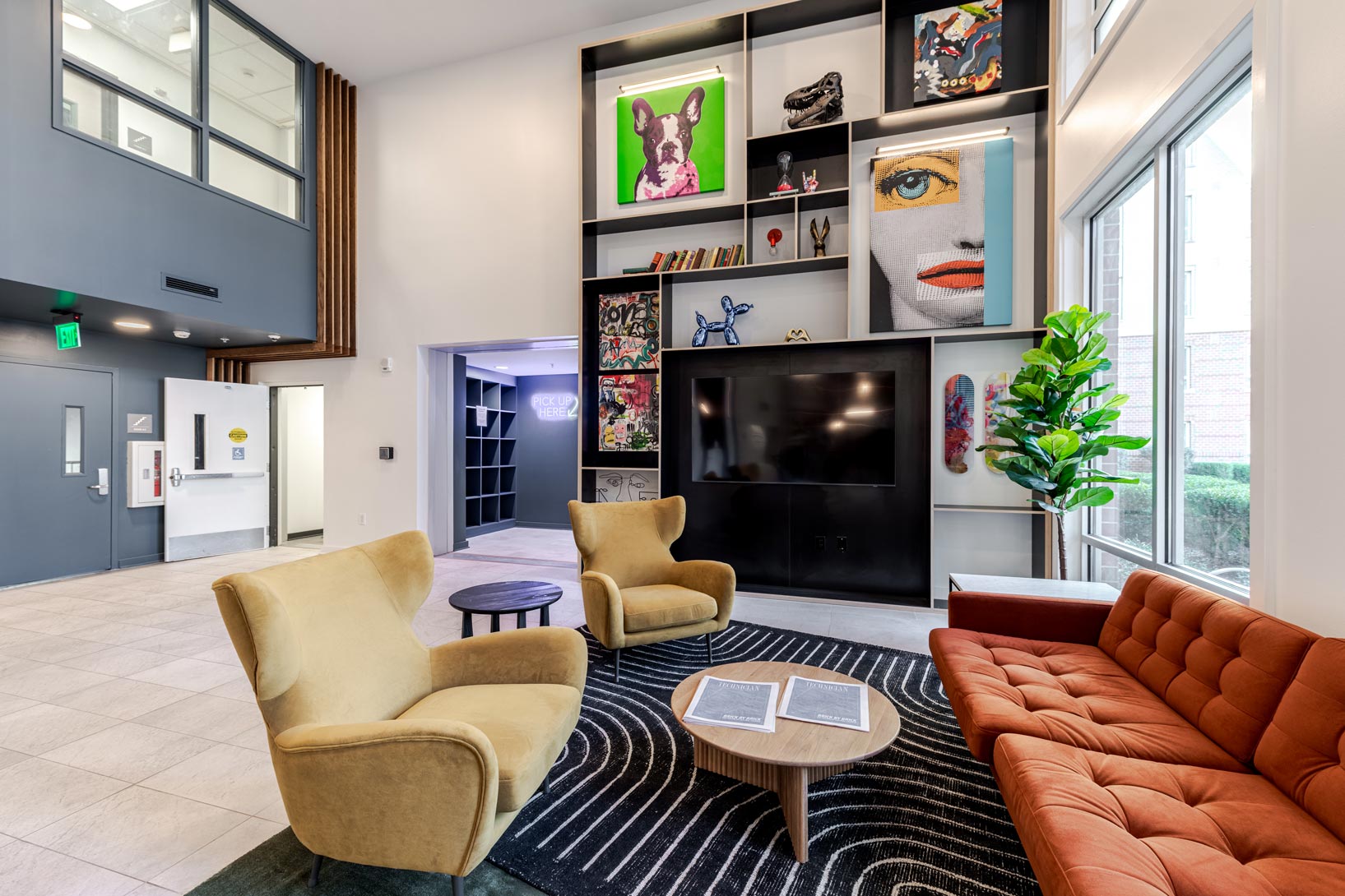 valentine commons apartments near nc state university front entrance lounge seating
